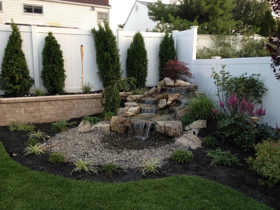 Retaining Wall with Natural Stone Waterfall