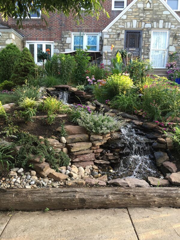 waterfalls, ponds, landscaping, retaining walls, patios, fire pits, outdoor kitchens, water feature, landscape, hardscape 