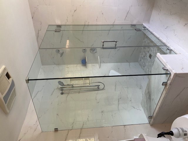 Frameless Shower Enclosures by Glasstech