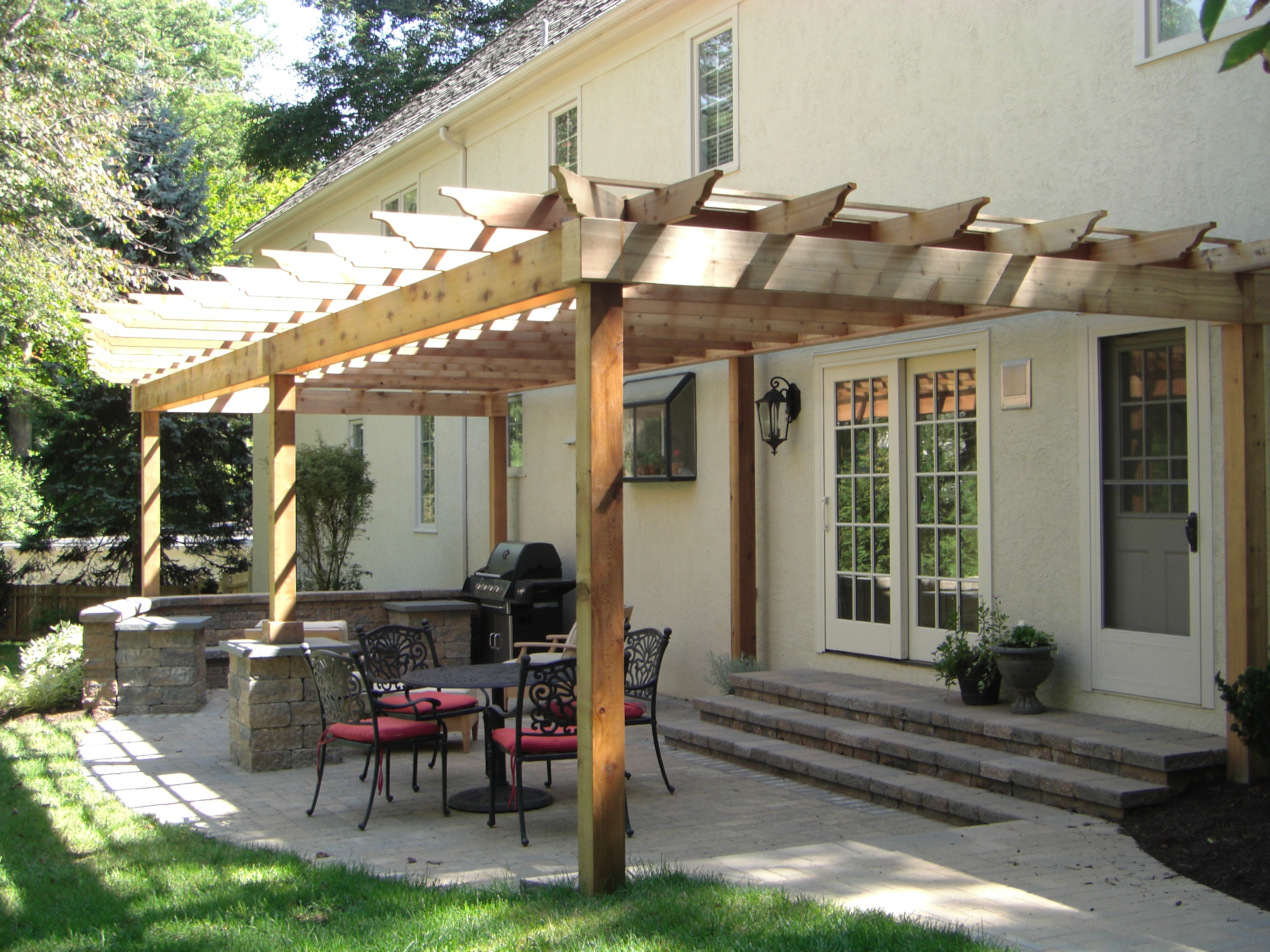 Back Patio with Pergola and Seating Wall